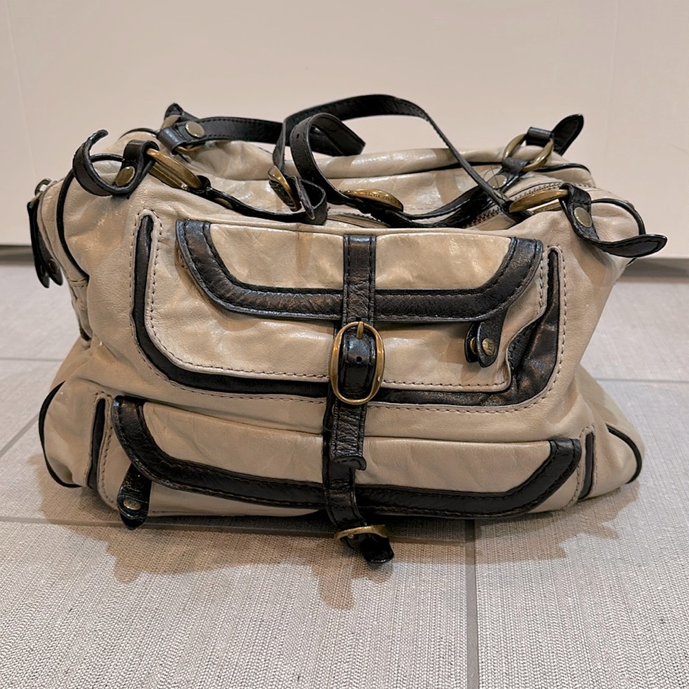Olivia Harris large gray leather bag with black adjustable straps